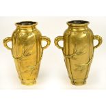 A pair of 19th/early 20th century Chinese polished bronze vases with simulated bamboo handles