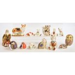 A group of fourteen Royal Crown Derby paperweights comprising large teddy bear, bald eagle, Royal