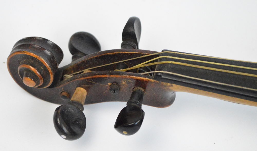 A full size German violin with one-piece back, unlabelled, length of back 35.5cm, with a bow (2). - Image 4 of 7