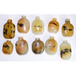 Ten various Chinese decorative scent bottles.