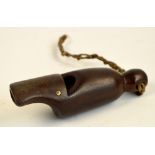 An unusual 19th century horn whistle with wooden tooth rest to underside, length 9.5cm.