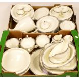 A quantity of dinner and coffee ware in Wedgwood "Amherst" pattern, comprising eight dinner
