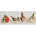 A collection of four Royal Crown Derby bird paperweights, all with gold stoppers, height of