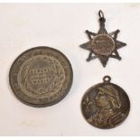 A commemorative Joan of Arc token,