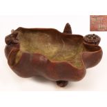 An unusual 19th century Chinese Yixing brush washer modelled as a lotus flower surmounted with a