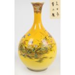 A large Japanese Meiji period Satsuma vase, the yellow ground body decorated with birds and
