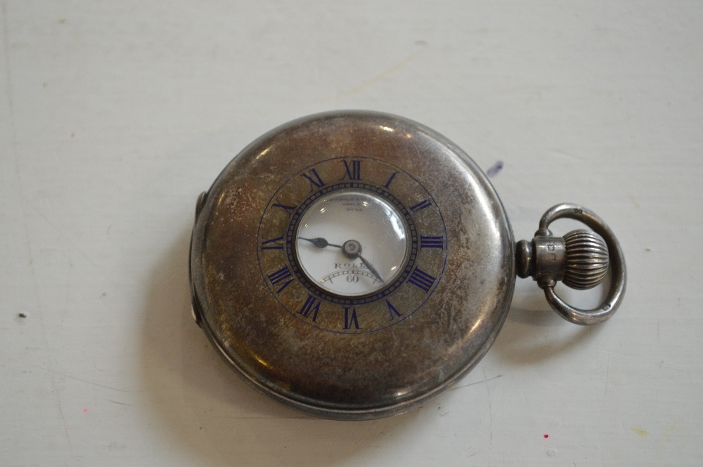 ROLEX; a silver half hunter cased crown wind pocket watch, retailed by H. Pidduck & Son, Hanley.