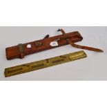 A WWI period military issue brass mapping rule, A&A Ltd, in strap and brass bound case, length 47cm.