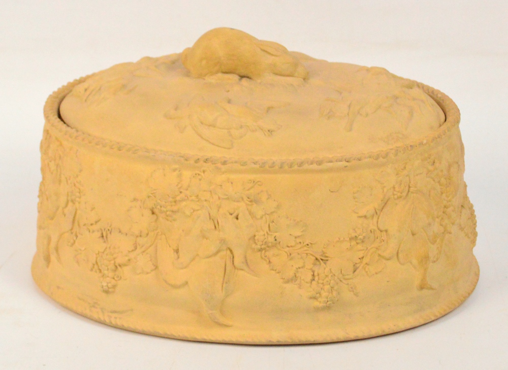 WITHDRAWN

A mid 19th century Wedgwood cane ware game pie dish, with glazed stoneware liner,