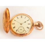 A late 19th century gold plated full hunter crown wind pocket watch with engraved case,