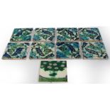 A set of eight Pilkington's floral decorated square section tiles with Persian design, each 15.25