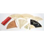 A 19th century Chinese Canton ivory brise fan with twenty-five sticks finely carved and pierced