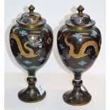 A pair of early 20th century Chinese cloisonné urn shaped vases and covers,