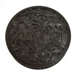 An early 19th century Chinese Canton carved tortoiseshell circular snuff box, the lid finely