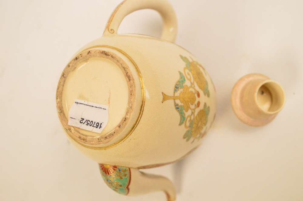 A Japanese Meiji period Satsuma teapot, the angled spout above floral decorated red and cream ground - Image 6 of 6