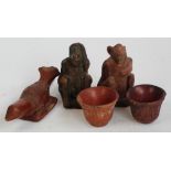 Two similar pre-Columbian style terracotta figures of seated monkeys,