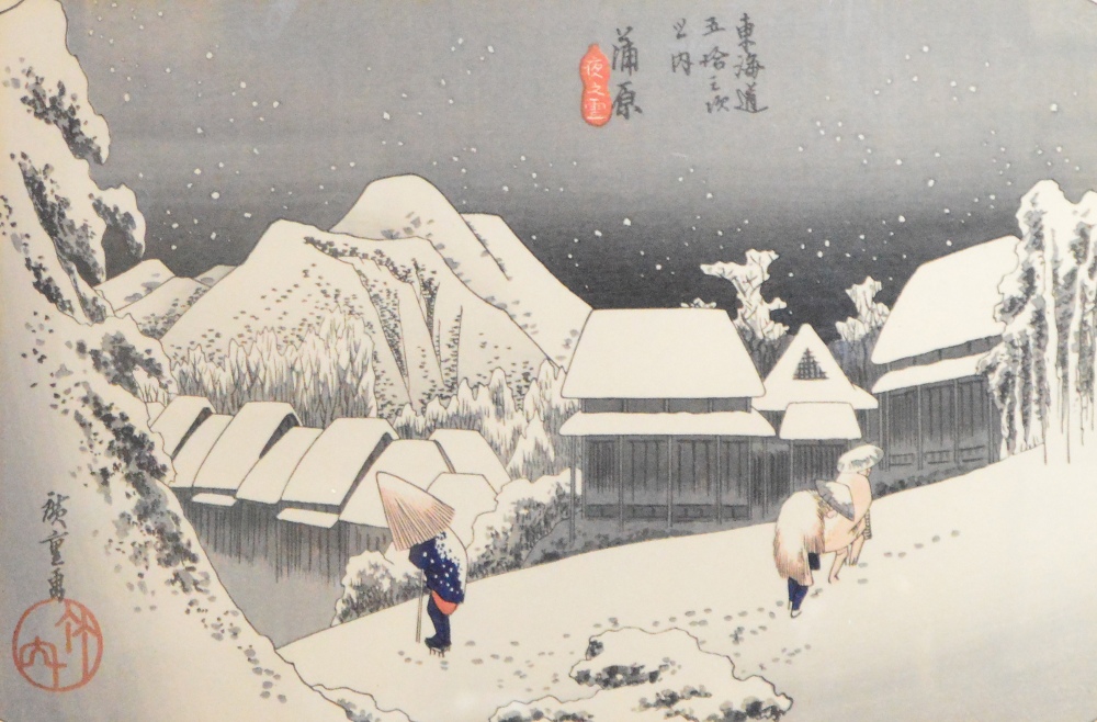 A Japanese woodblock print depicting figures in a winter landscape,