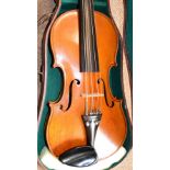 A full size German viola with two-piece back, unlabelled, length of back 38.7cm, cased.