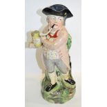 A 19th century pearlware toby jug "Hearty Good Fellow", height 28cm.