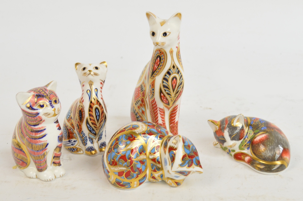 A collection of five Royal Crown Derby cat paperweights, all with gold stoppers, height of tallest