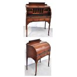 An Edwardian inlaid mahogany cylinder top bureau with five small apertures to the interior and two