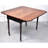 An early 20th century mahogany Pembroke table with single drawer raised on tapering legs