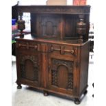 An early 20th century oak sideboard,