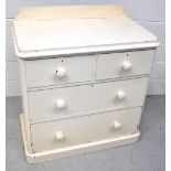 A Victorian white painted pine chest of drawers, two short drawers above two long drawers,