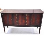 A reproduction serpentine fronted sideboard,