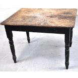 An early 20th century pine country kitchen table on ring turned legs, width 115cm.