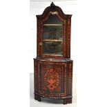 An early 19th century Dutch marquetry inlaid free standing corner cupboard,