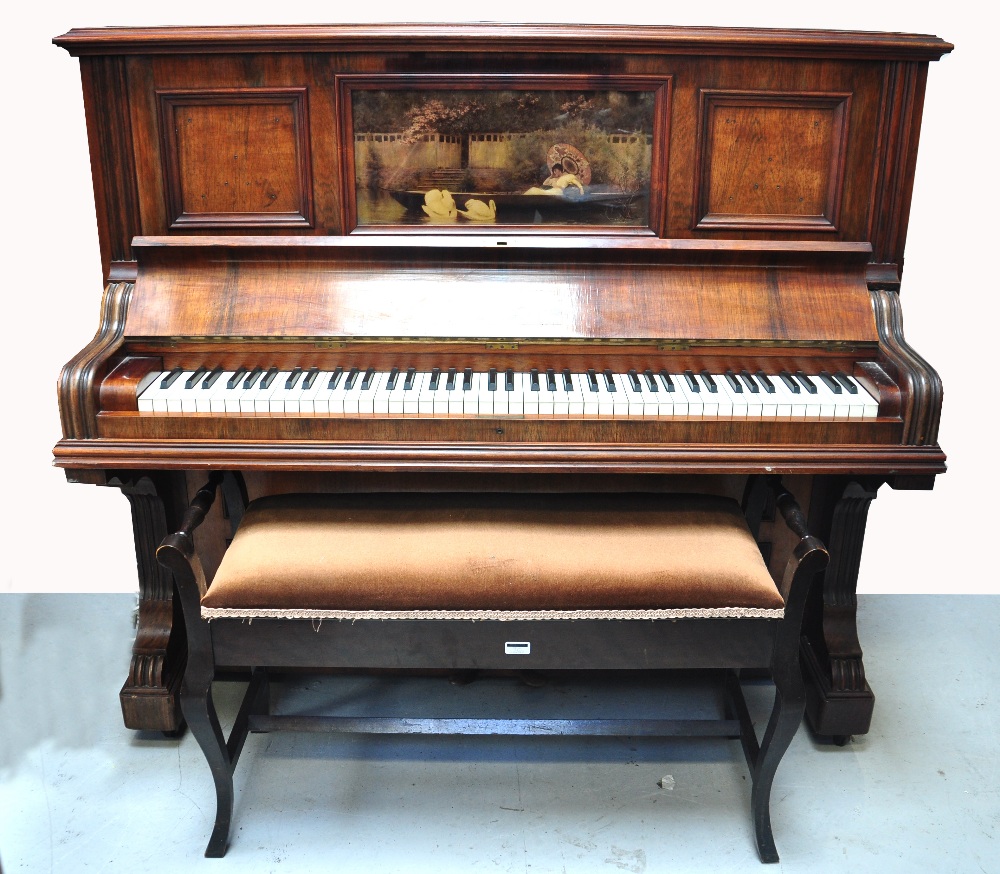 A mid to late 19th century rosewood piano by John Brinsmead & Sons of London,