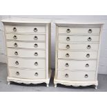 Two contemporary tall white painted six drawer chest of drawers with foliate decoration (2).