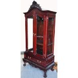 A reproduction mahogany display cabinet,