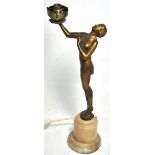 A c.1940s spelter Art Deco figurine lamp on an alabaster base, lacking shade.