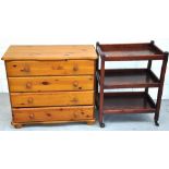 A contemporary pine chest of four drawers and a three tiered trolley (2).