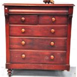 A Victorian mahogany chest of drawers, two short draws above three long draws on ring turned legs,