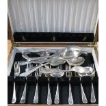 An early 20th century oak cased canteen of silver plated cutlery comprising approximately forty