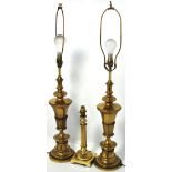 A pair of classical urn shaped brass lamps and a brass column table lamp (3).