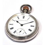 A black forest style wooden heavily carved pocket watch style holder with velvet lined interior,