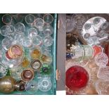 A box of vintage glassware, mainly wine and champagne glasses.