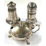 A hallmarked silver salt, pepper and mustard, Birmingham date rubbed, approx weight 3ozt.