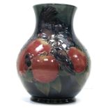 A large Moorcroft Finches on dark blue ground baluster vase,