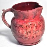 A Barnstaple pink ground jug impressed to the base, "Barnstaple 78",