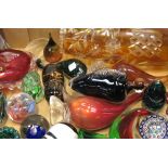 A collection of glass to include millefiori paperweights, Murano fish etc.