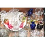 A box of glassware to include vintage cranberry colour glass, vases, bowls etc.