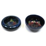 A Moorcroft Anemone on dark blue ground bowl, diameter 11cm,
