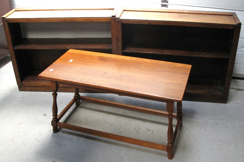 An oak coffee table on turned legs and stretchers and two small bookcases (3).