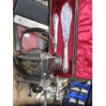 A quantity of plated ware to include cased sets of flatware, a spirit kettle etc.