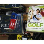 A collectors lot to include some boxed golf balls various golf related bottle stoppers,